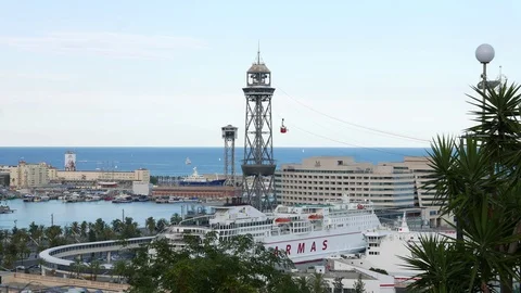 Cableway red cabins quickly move over Barcelona port, timelapse Stock Footage 102919478