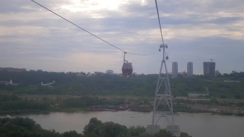 Cableway through the river connecting two parts of the sity. Video stock 106301482