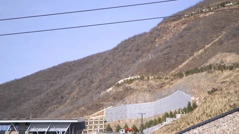 Cableways in the mountains of China during the 2022 Beijing Olympic and Stock Footage 240159746