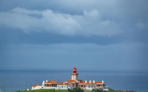 Cabo da Roca Lighthouse below the stormy clouds 스톡 사진