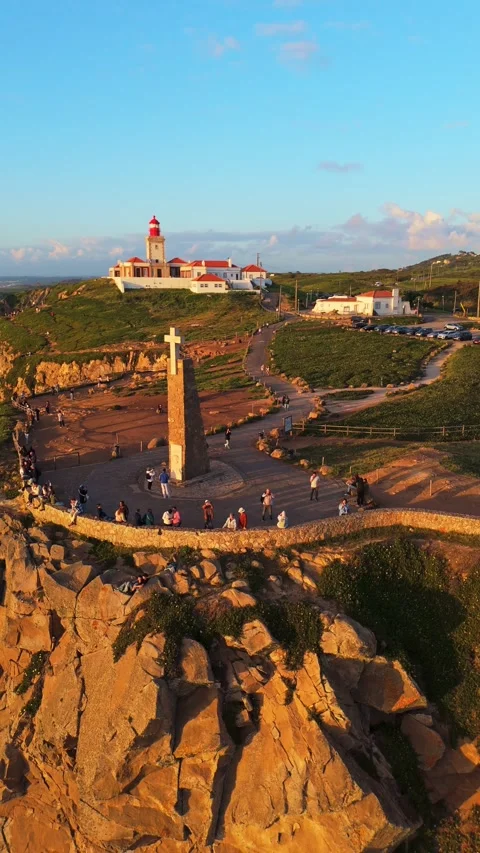 Cabo da Roca at Sunset. Cliffs, Lighthouse and Cross. Portugal. Aerial View Stock Footage 333898527
