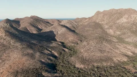 CABO PULMO BCS MEXICO-2023: A View Of A Mountain Range From The Air Stock Footage 245838243
