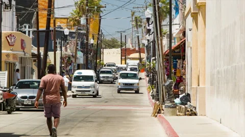 Cabo San Lucas Mexico Side Street Scene with Local Shops and Vehicles Stock Footage 61007161