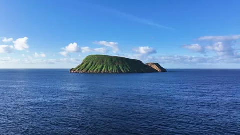 Cabras Islets in azure Atlantic ocean of Azores near Terceira island 動画素材 329528102