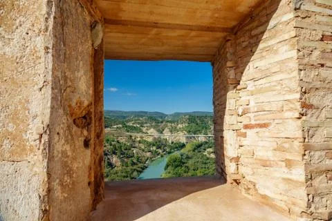 Cabriel river and bridge through castle window Stock Photos