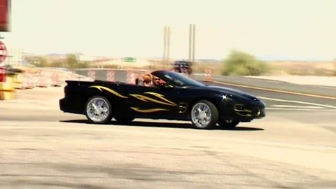 Cabrio in desert Stock Footage 81576759