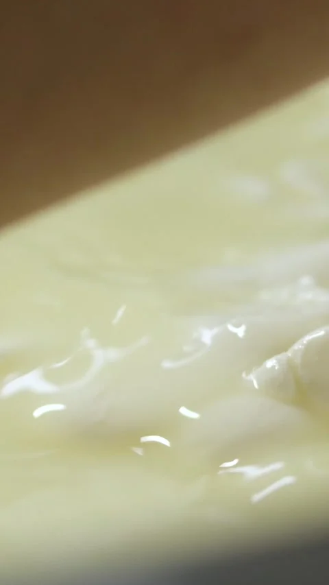 Caciocavallo kachakovala cheese preparation process female hands in black latex Stock Footage 275558385
