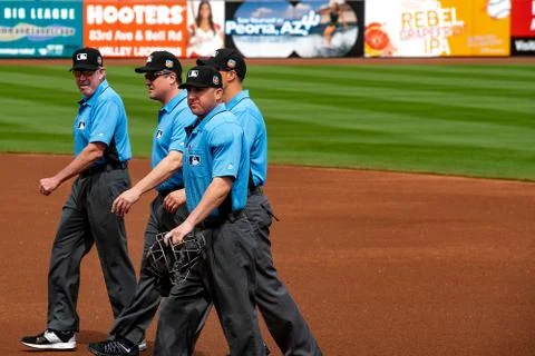Cactus League Spring Training Baseball umpires walking on field Stock Photos