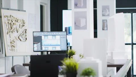 Cad architecture software on computer at empty office desk Stock Photos
