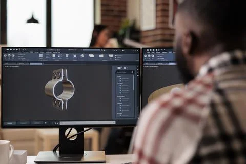 Cad engineer working with manufacturing software Stock Photos
