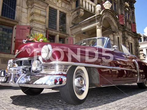 Cadallic wedding car city hall Delft Stock Photos