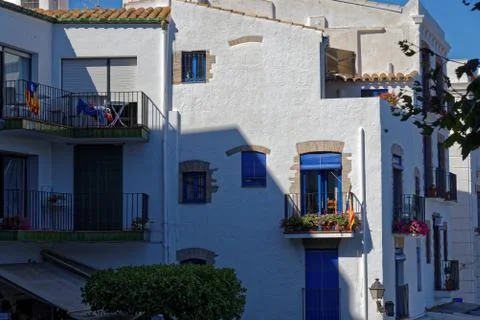 Cadaques, facade design with window and balcony and flowers Stock Photos