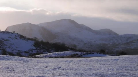 Cader Idris against winter light, Southern Snowdonia, Mid Wales, UK Stock Footage 293367859