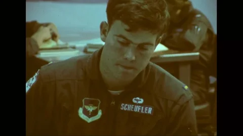 Cadet talks to instructor in a study hall during women pilot training - 1976 Stock Footage 103748415