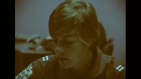 Cadet talks to instructor in a study hall during woman pilot training - 1976 Stock Footage 103749672