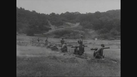 Cadets train with rocket launcher under the officer's supervision - 1950 Stock Footage 90460188