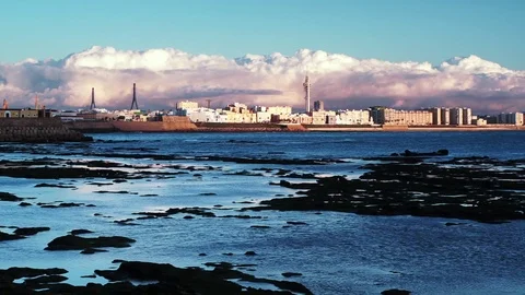 Cadiz Skyline with Cumulus Clouds Sunset Cadiz Spain HD Stock Footage 84605393