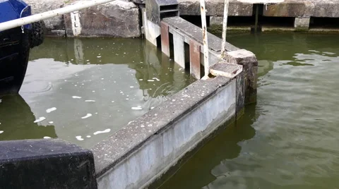 Caen Canal Locks. Tight shot of lock gates moving Stock Footage 40612957