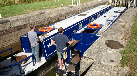 Caen Hill Canal Locks.  2 boats in a lock Stock Footage 40627307
