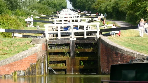 Caen Hill Canal Locks.  A close view up the stepped locks Video stock 40598637