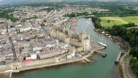Caernarfon town and its medieval castle, Wales, UK Video stock 312986624