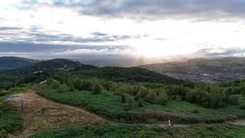 Caerphilly Mountain Landscape at Sunset with Sunlight Through Clouds Stock Footage 343577431