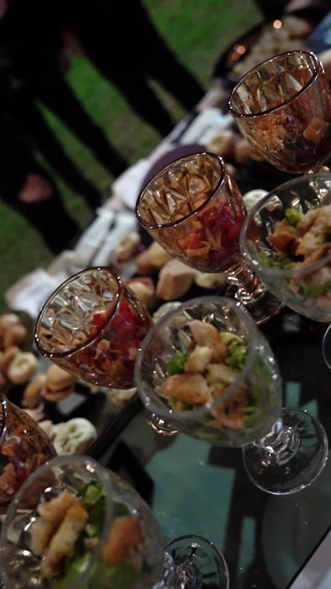 Caesar and Caprese Salad Cups in a welcome reception Stock Footage 336639625