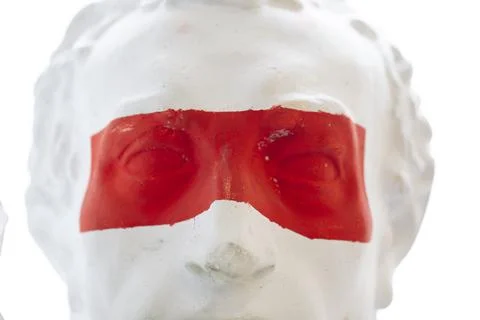 Caesar plaster head with red stripe on the eyes. Stock Photos