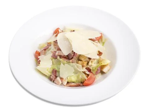 Caesar salad with bacon and parmesan. Stock Photos