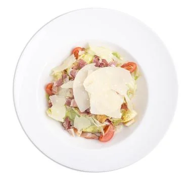 Caesar salad with bacon and parmesan. Stock Photos