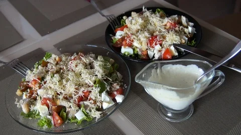 Caesar salad. Chef cooking caesar. Cooking process. Fresh salad. Chicken Caesar Stock Footage 100081102