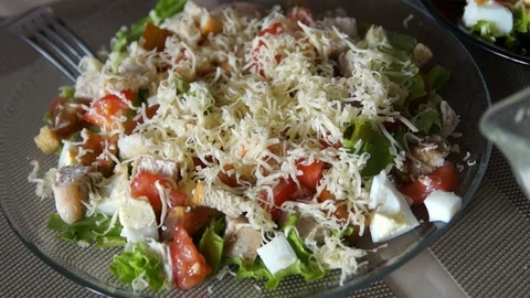 Caesar salad. Chef cooking caesar. Cooking process. Fresh salad. Chicken Caesar Stock Footage 100081212