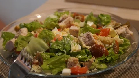 Caesar salad. Chef cooking caesar. Cooking process. Fresh salad. Chicken Caesar Stock Footage 100081455