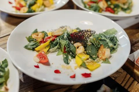 Caesar salad with chicken, cherry tomatoes, lettuce Foto stock