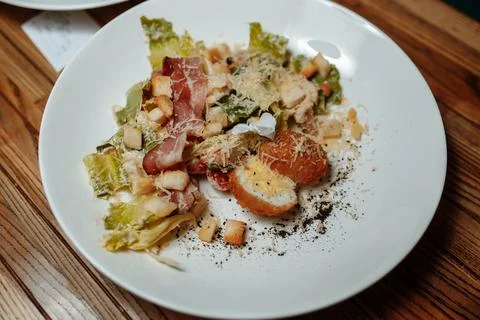 Caesar salad with chicken, cherry tomatoes, lettuce Stock Photos
