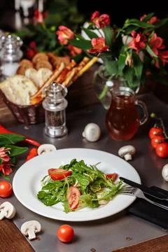 Caesar salad with chicken, cherry tomatoes, lettuce 스톡 사진