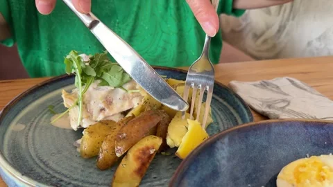 Caesar salad Chicken roll with mushrooms and country-style potatoes. lunch Stock Footage 317710887