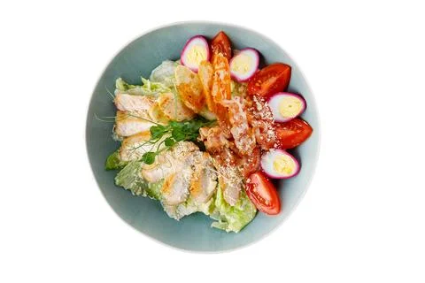 Caesar salad with chicken on a white background, isolate, for food delivery menu Stock Photos