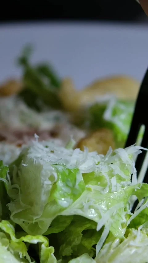 Caesar salad. Classic Caesar salad with romaine lettuce, croutons, baked chicken Stock Footage 318729727