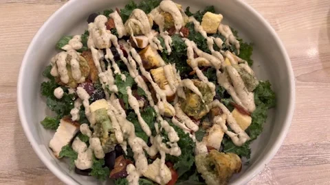 Caesar salad with crispy broccoli Stock Footage 323605567