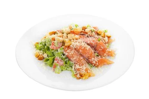 Caesar salad with fish on plate white isolated Stock Photos
