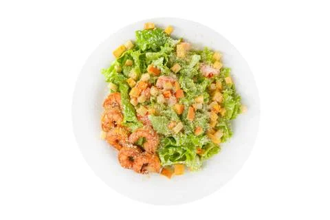 Caesar salad with fish on plate white isolated Stock Photos