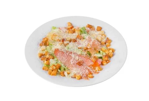Caesar salad with fish on plate white isolated Stock Photos