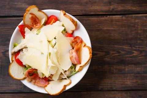 Caesar salad with fried chicken meat, close up Stock Photos