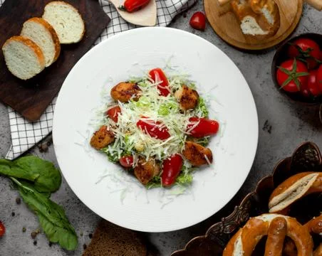 Caesar salad with fried chicken Stock Photos
