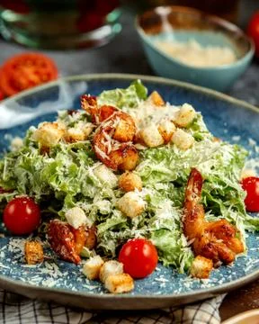 Caesar salad with fried shrimps Stock Photos