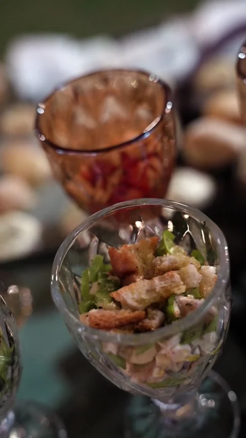 Caesar Salad in Glass Cup Stock Footage 336639584