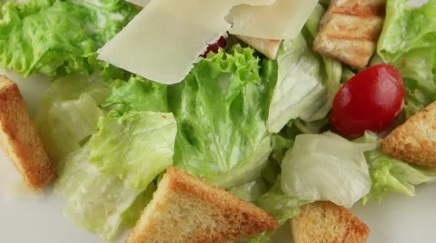 Caesar salad with grilled chicken closeup Stock Footage 56429391