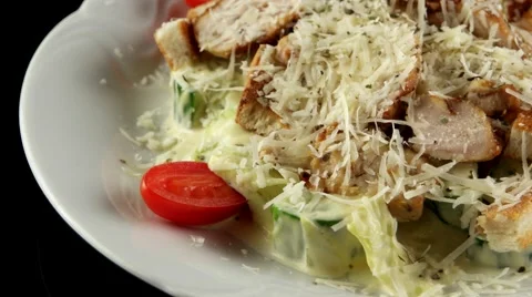 Caesar salad with grilled chicken, loop Stock Footage 61710523