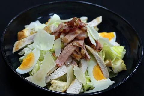 Caesar salad with grilled chicken Stock Photos